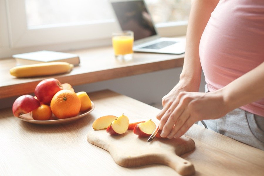 Pregnant woman in kitchen_Dietitians On Demand
