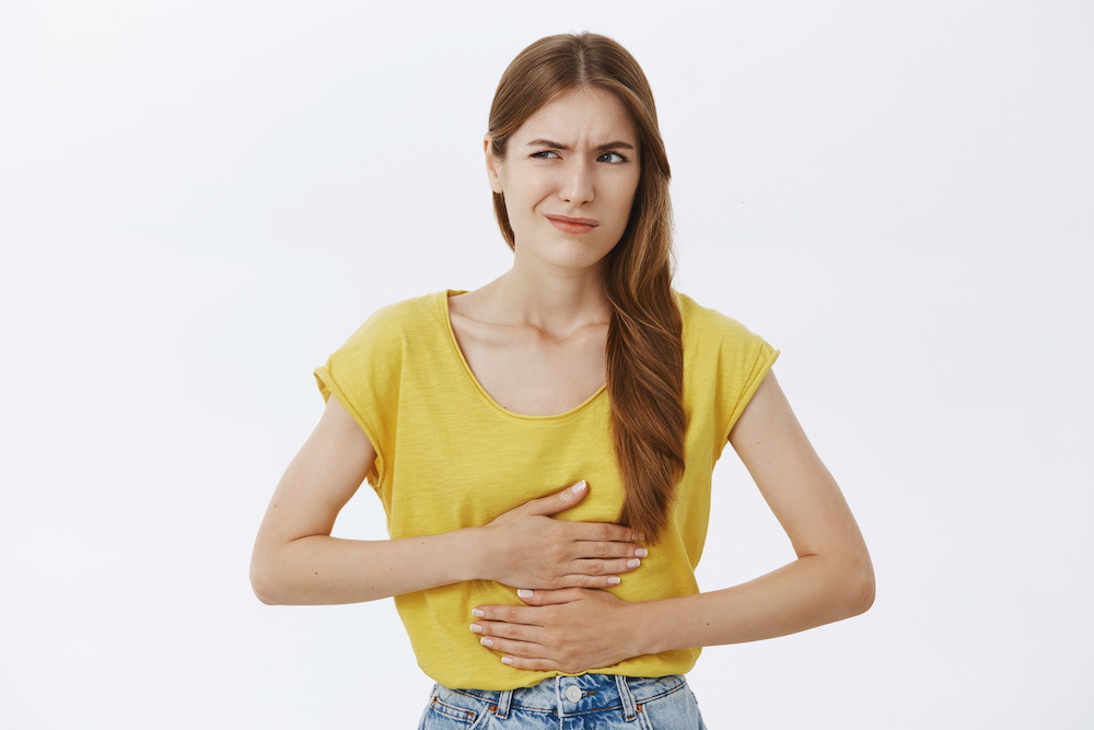 woman with upset stomach_Have You Heard of GERD?_Dietitians On Demand